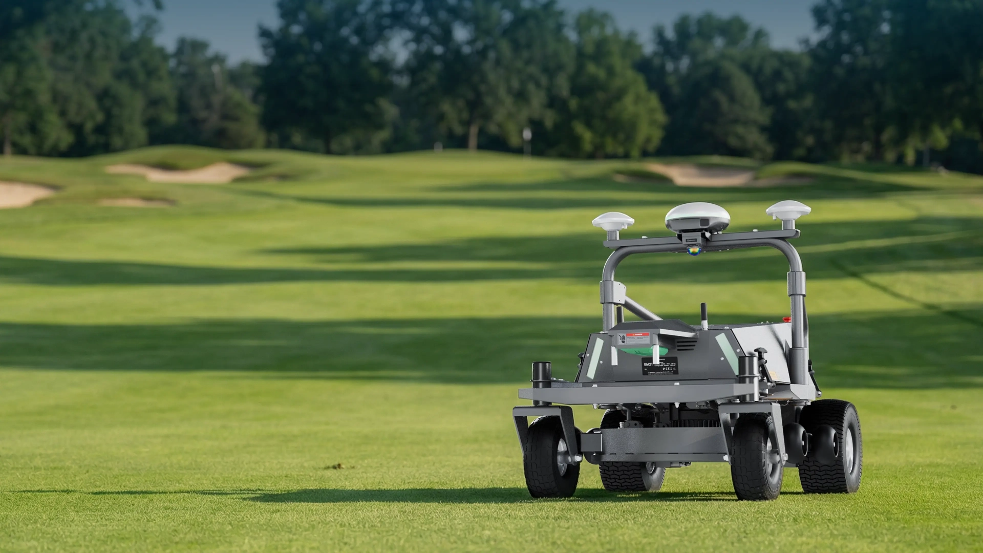 FJD RM21 robotic mower working a golf course rough