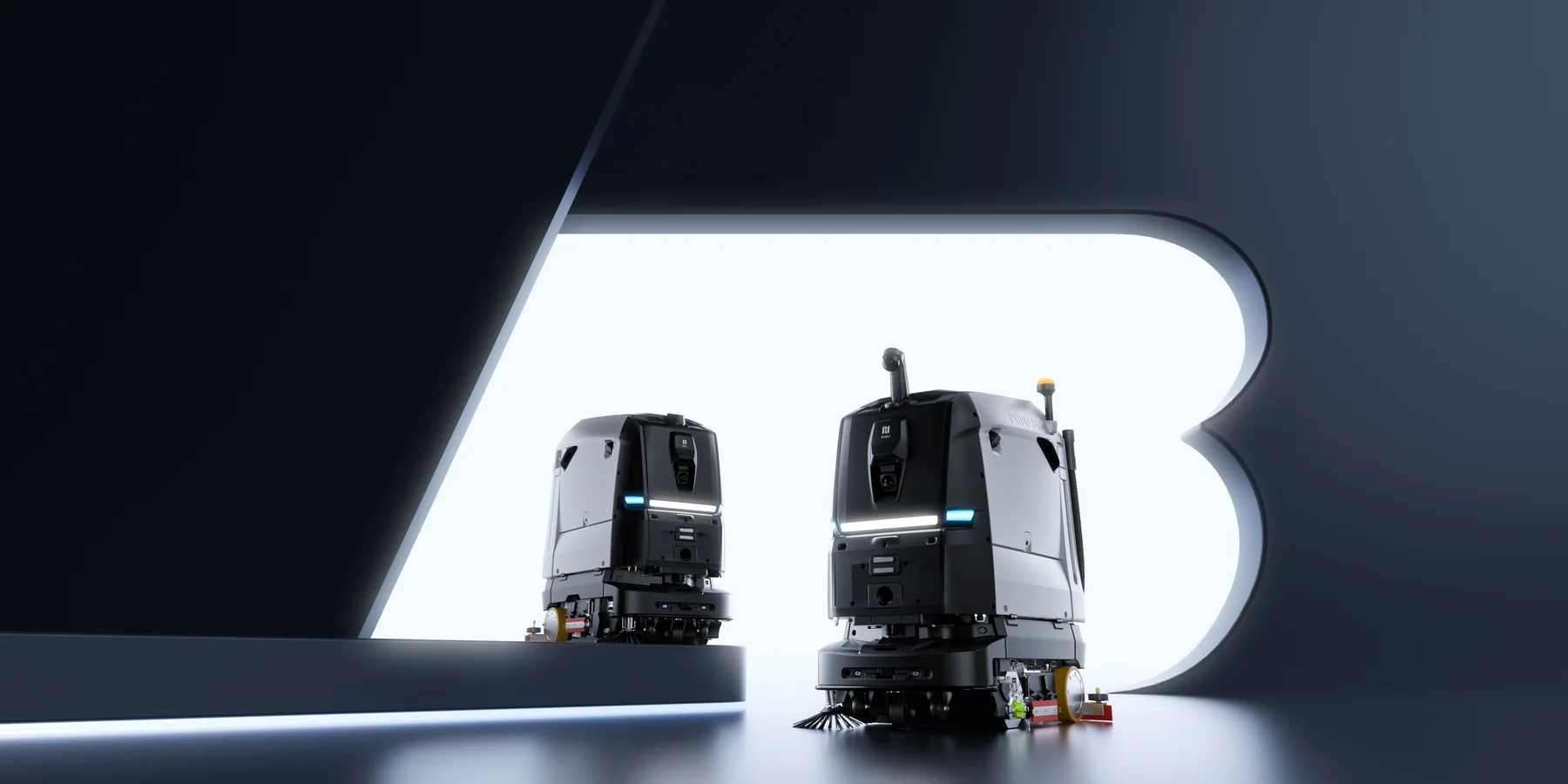 Two PUDU BG1 scrubber-dryer robots on a dark studio floor