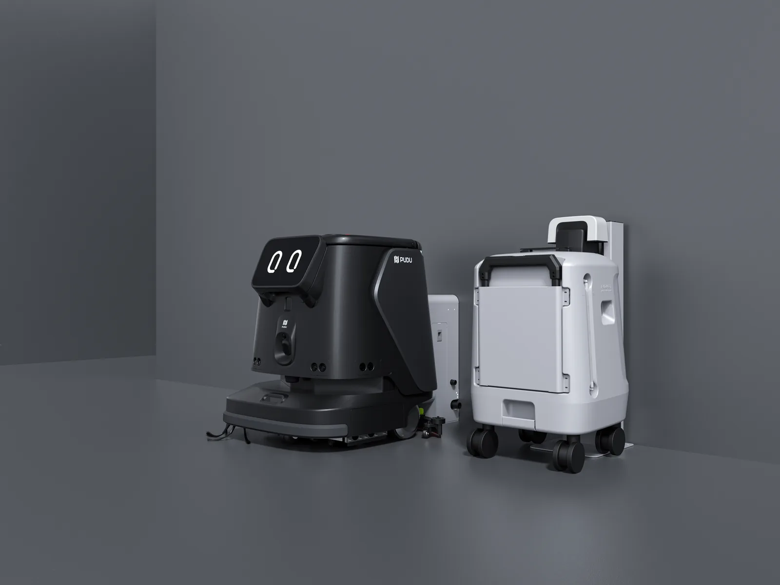 PUDU CC1 Pro cleaning robot parked alongside its water station